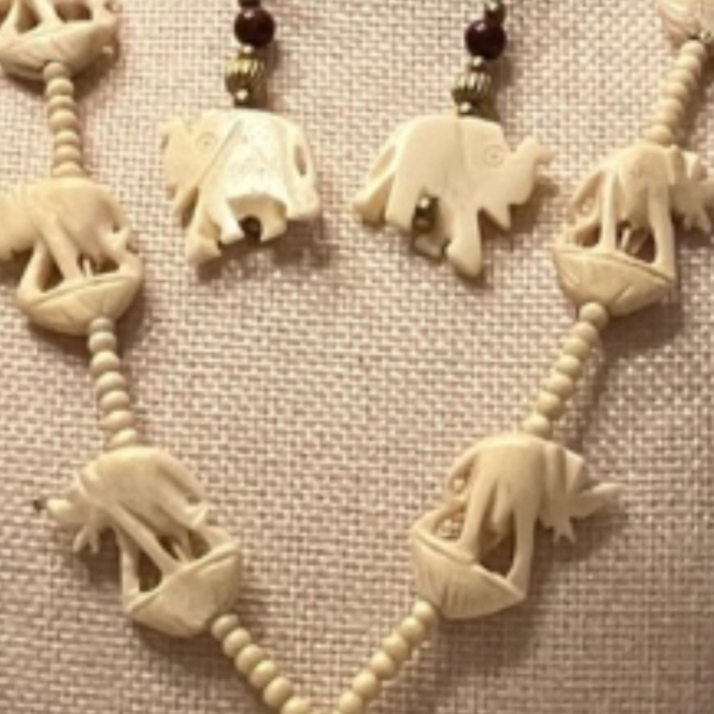 HANDCRAFTED CARVED BONE ELEPHANT NECKLACE/ SET 28” hangs 14”.